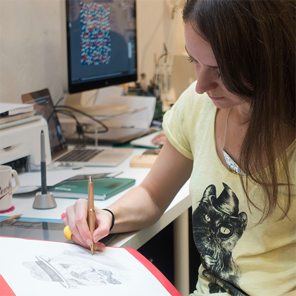 Kat, drawing 'Winston The Great' at our studio in East London
